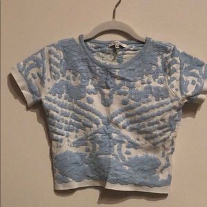 Crop shirt and skirt set.